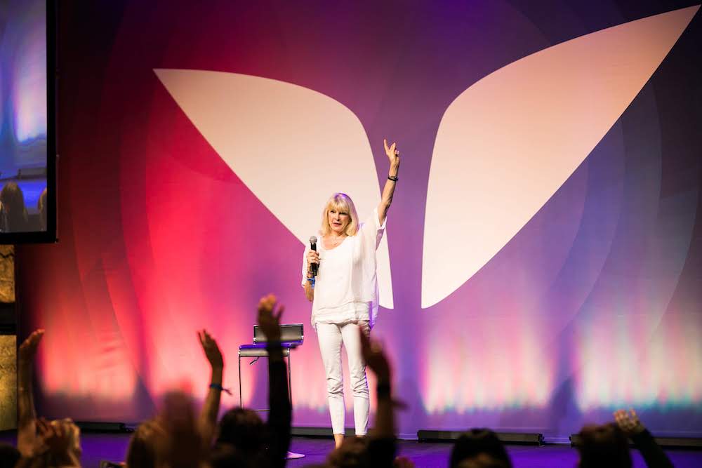Marisa Peer on stage at Mindvalley U in Tallinn, Estonia