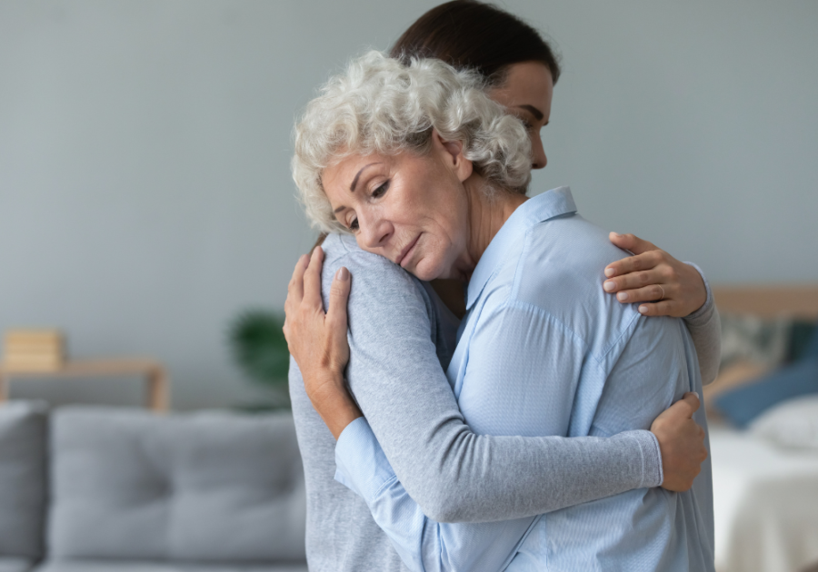 senior woman and daughter hugging mommy issues in women 