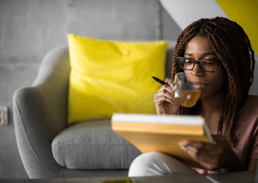 woman writing sipping tea Rare words with beautiful meanings